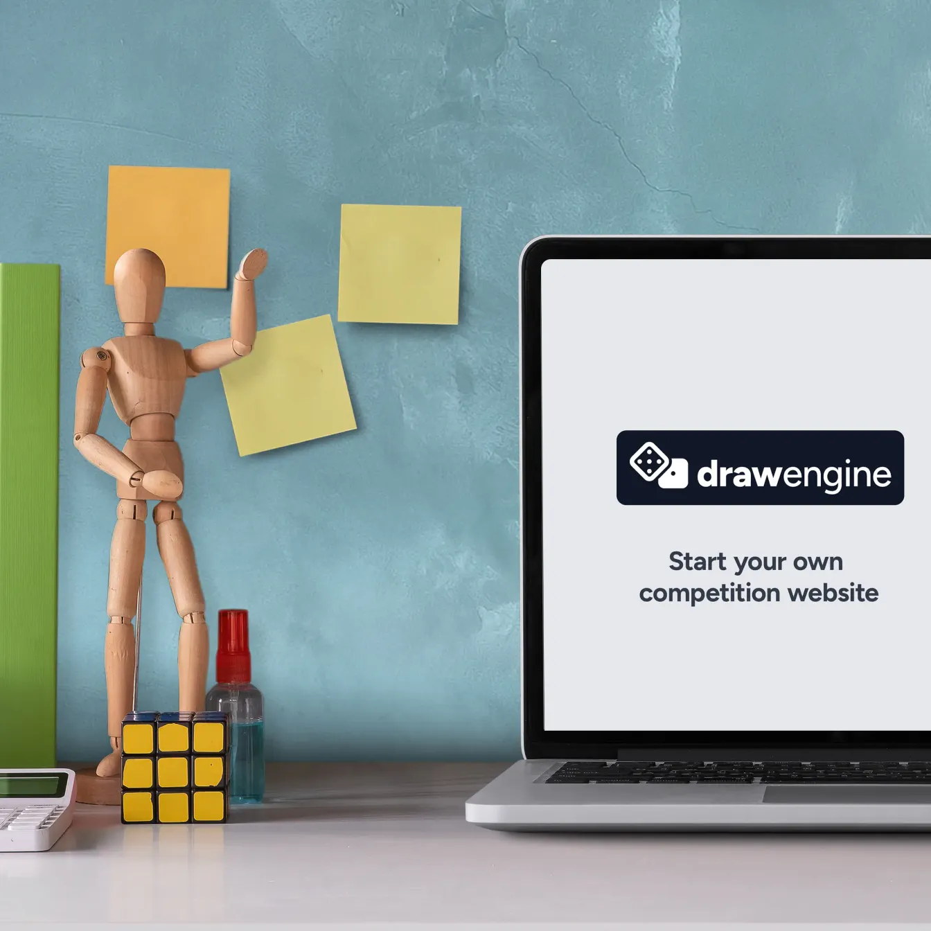 Person using a laptop to manage a competition website